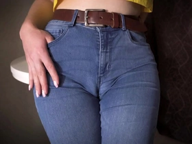 sexy milf teasing her big cameltoe in tight blue jeans